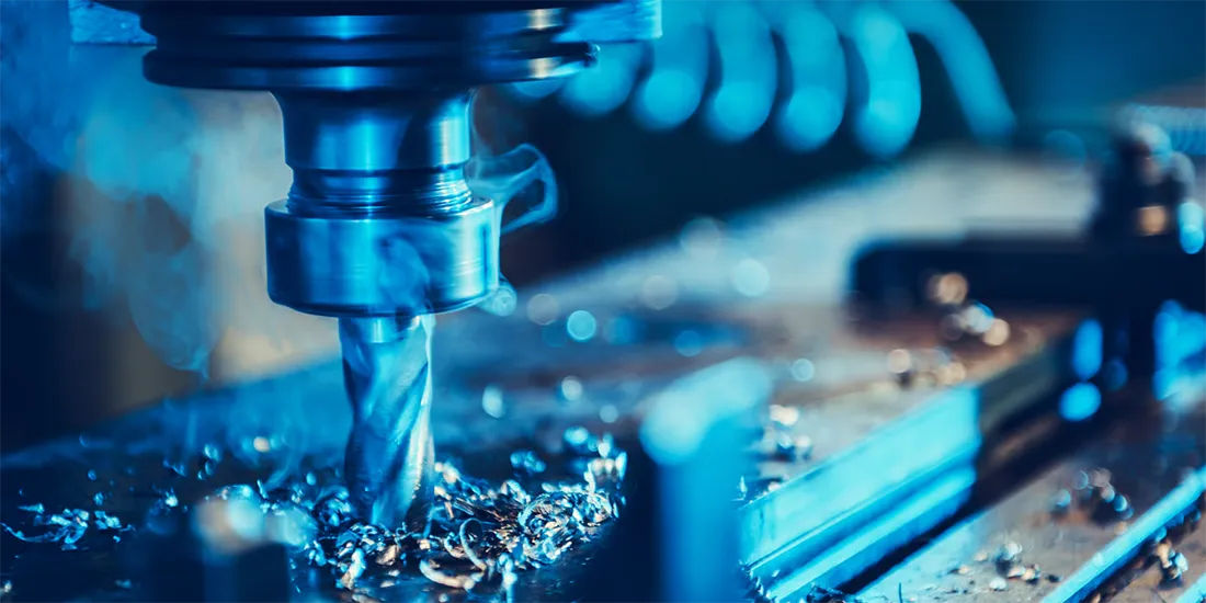 Close-up of precision CNC milling on an aluminum component